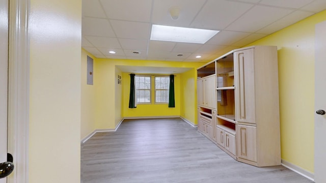 3388 Budds Creek Rd, Palmyra, TN 37142 - hall featuring light wood-type flooring, a paneled ceiling, and recessed lighting