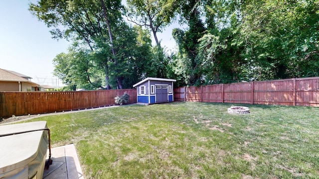 1012 Michaela Cir, Clarksville, TN 37043 - fenced backyard featuring an outdoor fire pit and a storage shed