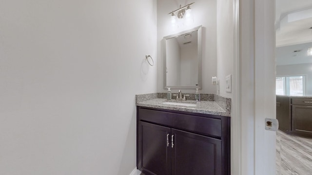 1012 Michaela Cir, Clarksville, TN 37043 - bathroom with vanity and wood finished floors