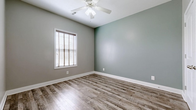 1012 Michaela Cir, Clarksville, TN 37043 - spare room featuring wood finished floors and a ceiling fan