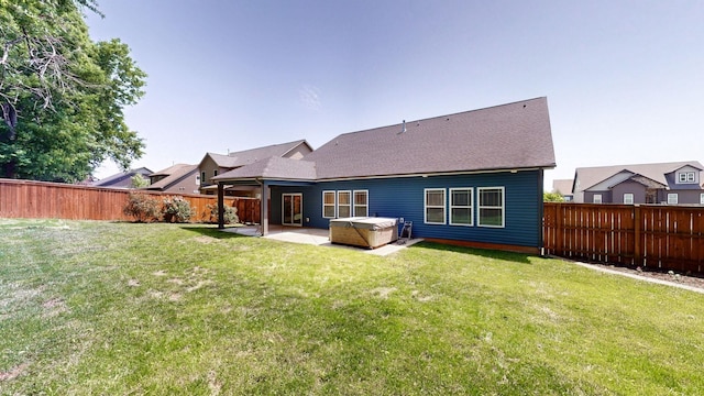1012 Michaela Cir, Clarksville, TN 37043 - back of house with a hot tub, a patio, a fenced backyard, and roof with shingles