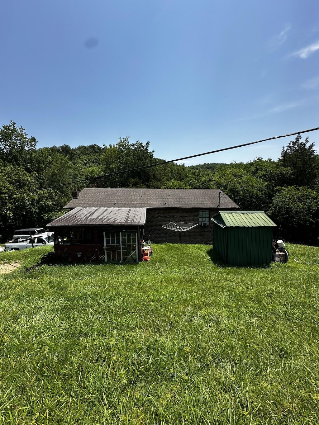 200 Stonewall Hwy, Carthage, TN 37030 - view of shed featuring a view of trees