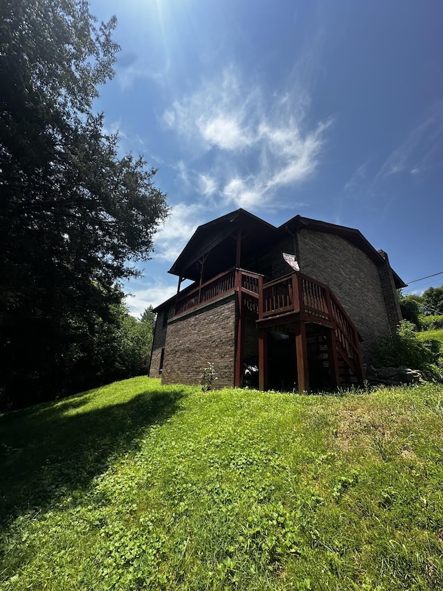200 Stonewall Hwy, Carthage, TN 37030 - back of house with a deck, a yard, and stairway