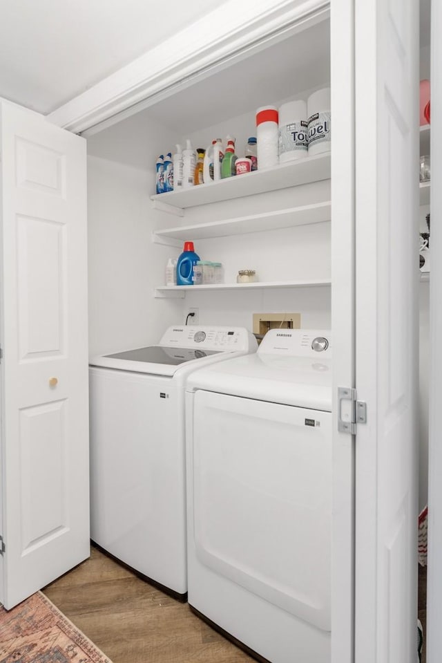 5813 Brentwood Trce, Brentwood, TN 37027 - laundry area with washer and dryer and light wood-type flooring