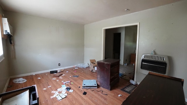 606 E Church St, Kenton, TN 38233 - empty room with heating unit and wood finished floors