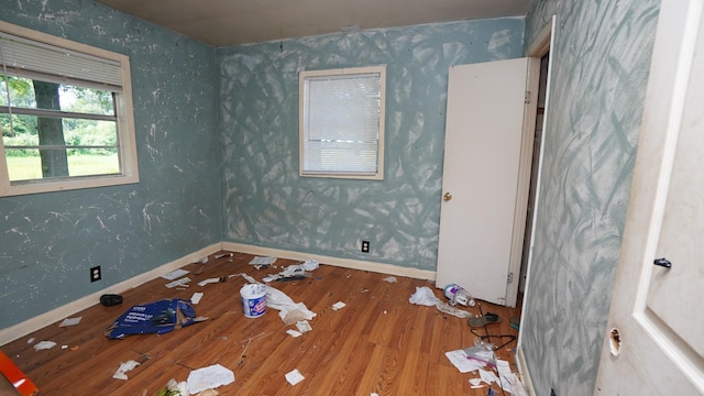 606 E Church St, Kenton, TN 38233 - empty room featuring wood finished floors and baseboards
