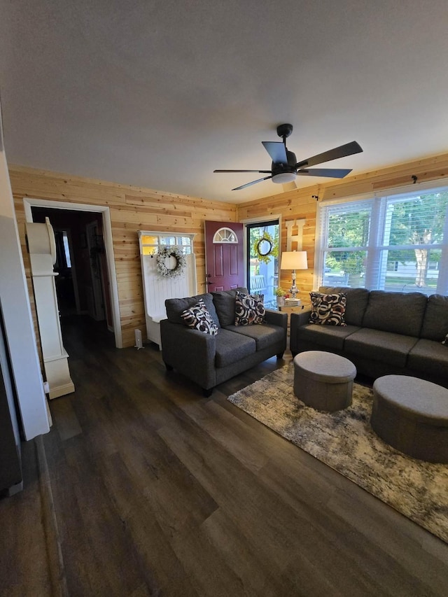 117 June Dr, Dickson, TN 37055 - living room featuring wooden walls, dark wood-style flooring, and ceiling fan