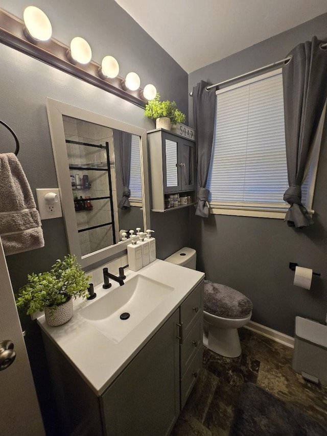 117 June Dr, Dickson, TN 37055 - bathroom featuring vanity, tiled shower, and vaulted ceiling