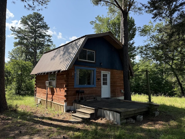 170 Webb Rd, Summertown, TN 38483 - back of house featuring a gambrel roof, log siding, a metal roof, a wooden deck, and cooling unit