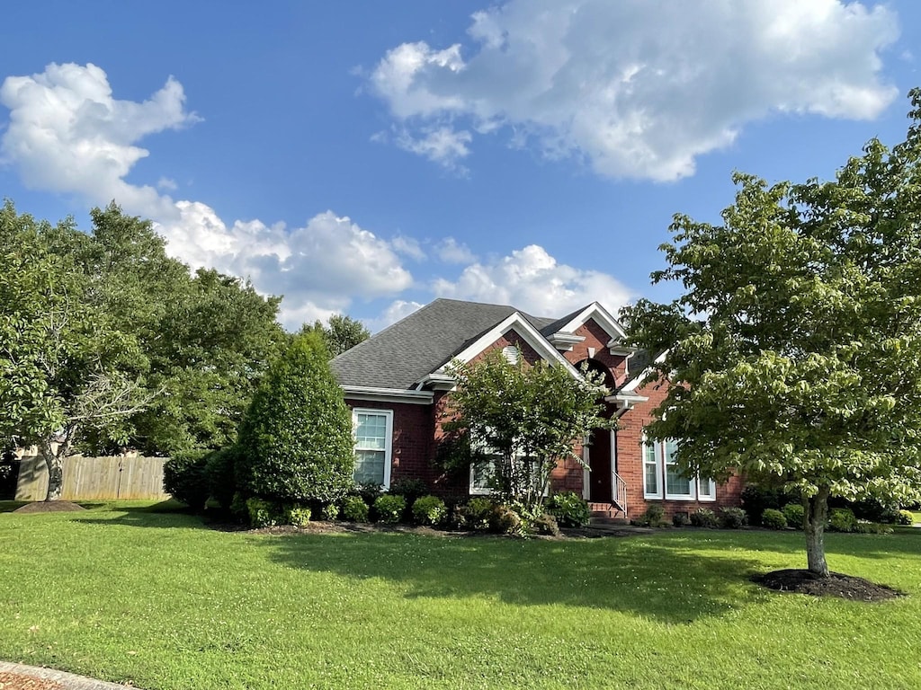 387 Natchez Trace Ct, Murfreesboro, TN 37127 - view of property hidden behind natural elements featuring brick siding