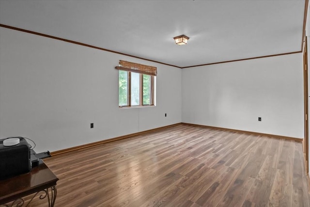 428 Gwin Cemetery Rd, Waverly, TN 37185 - spare room featuring ornamental molding and wood finished floors