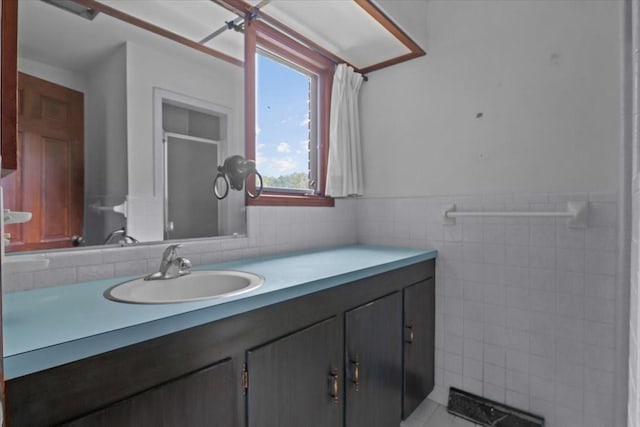 428 Gwin Cemetery Rd, Waverly, TN 37185 - full bathroom with tile walls, vanity, a wainscoted wall, and an enclosed shower