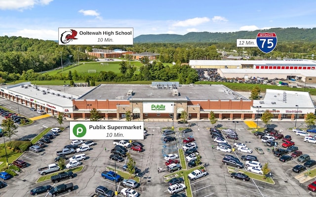 8366 Gracie Mac Ln, Ooltewah, TN 37363 - aerial view of a mountain backdrop and a commercial area