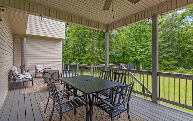 8366 Gracie Mac Ln, Ooltewah, TN 37363 - wooden terrace with a ceiling fan, outdoor dining area, and a lawn