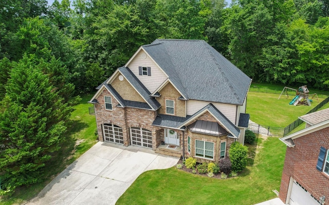8366 Gracie Mac Ln, Ooltewah, TN 37363 - craftsman-style house with driveway, roof with shingles, stone siding, an attached garage, and a front lawn