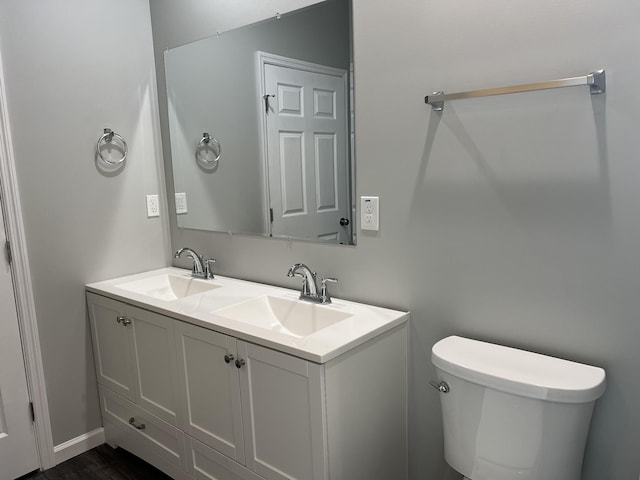 5291 Galen Rd, Lafayette, TN 37083 - bathroom with double vanity and wood finished floors