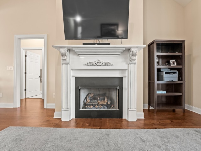 8300 Aedc Rd, Estill Springs, TN 37330 - detailed view of wood finished floors and a fireplace