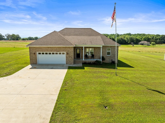 8300 Aedc Rd, Estill Springs, TN 37330 - view of front of property with a front lawn, an attached garage, a porch, and concrete driveway
