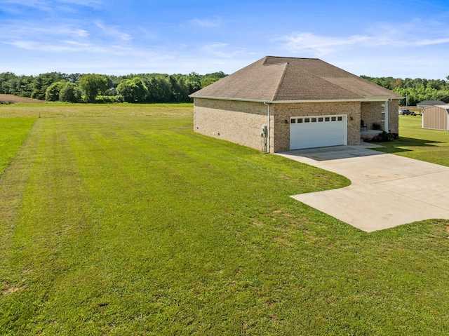 8300 Aedc Rd, Estill Springs, TN 37330 - view of side of home featuring concrete driveway, a garage, a yard, brick siding, and a storage unit