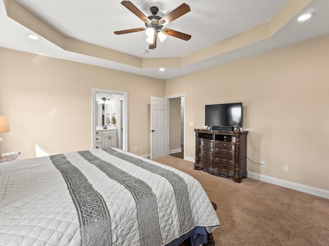 8300 Aedc Rd, Estill Springs, TN 37330 - carpeted bedroom with recessed lighting, a tray ceiling, ceiling fan, and ensuite bath