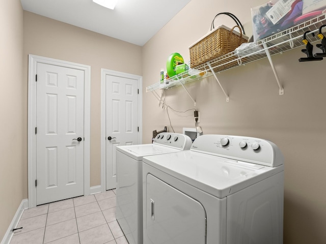 8300 Aedc Rd, Estill Springs, TN 37330 - laundry area with washer and dryer and light tile patterned floors