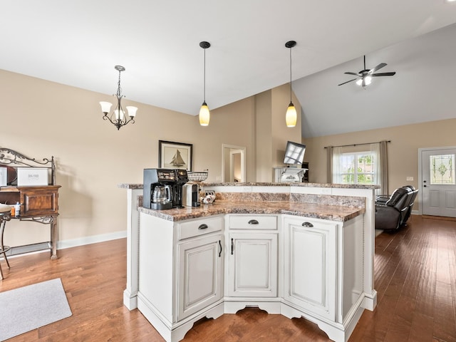 8300 Aedc Rd, Estill Springs, TN 37330 - kitchen featuring open floor plan, ceiling fan, high vaulted ceiling, decorative light fixtures, and wood finished floors
