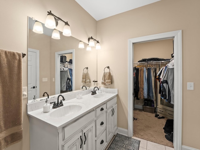 8300 Aedc Rd, Estill Springs, TN 37330 - bathroom with double vanity, tile patterned floors, and a spacious closet