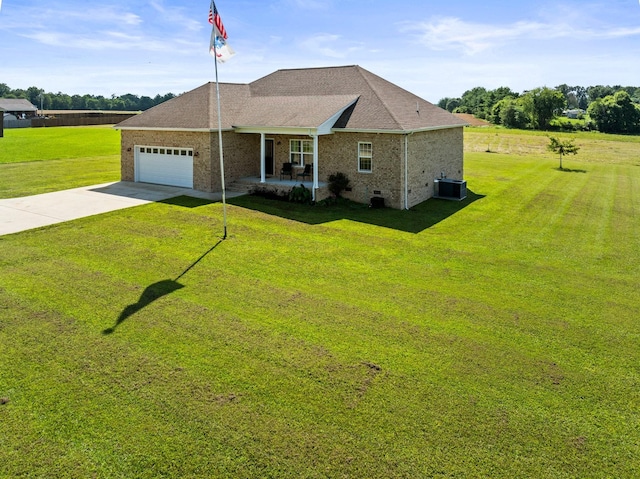 8300 Aedc Rd, Estill Springs, TN 37330 - view of front of home featuring concrete driveway, a front lawn, an attached garage, brick siding, and a porch