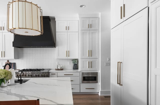 1526 Lipscomb Dr, Brentwood, TN 37027 - kitchen featuring range hood, decorative backsplash, white cabinets, recessed lighting, and light stone countertops