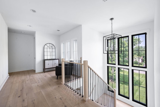 1526 Lipscomb Dr, Brentwood, TN 37027 - corridor with an upstairs landing, light wood-style flooring, plenty of natural light, a chandelier, and recessed lighting
