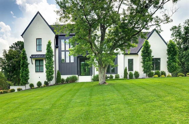 1526 Lipscomb Dr, Brentwood, TN 37027 - view of front of house with a front yard and a standing seam roof