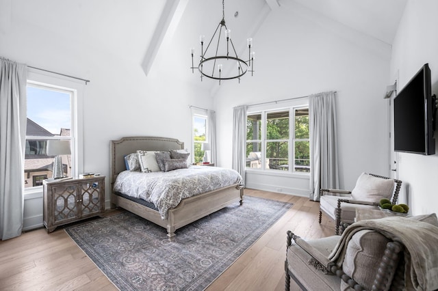1526 Lipscomb Dr, Brentwood, TN 37027 - bedroom featuring a chandelier, multiple windows, high vaulted ceiling, beamed ceiling, and light wood-style floors