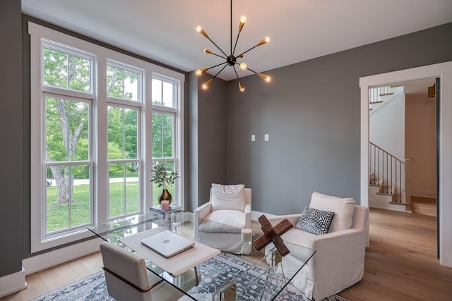 1526 Lipscomb Dr, Brentwood, TN 37027 - sitting room with a chandelier, stairs, and light wood finished floors