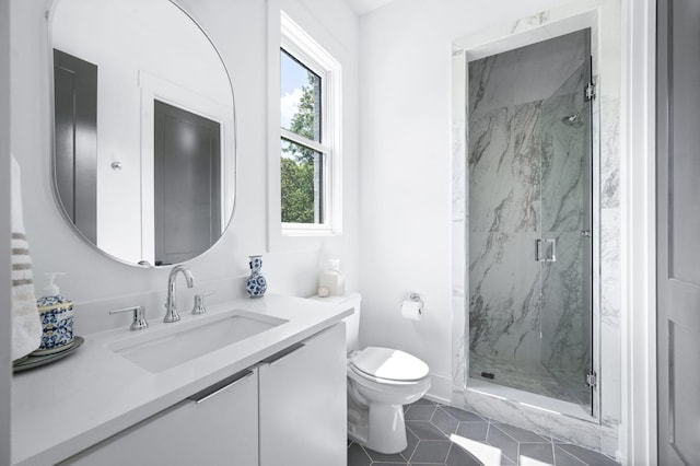 1526 Lipscomb Dr, Brentwood, TN 37027 - full bathroom featuring a marble finish shower, tile patterned flooring, and vanity