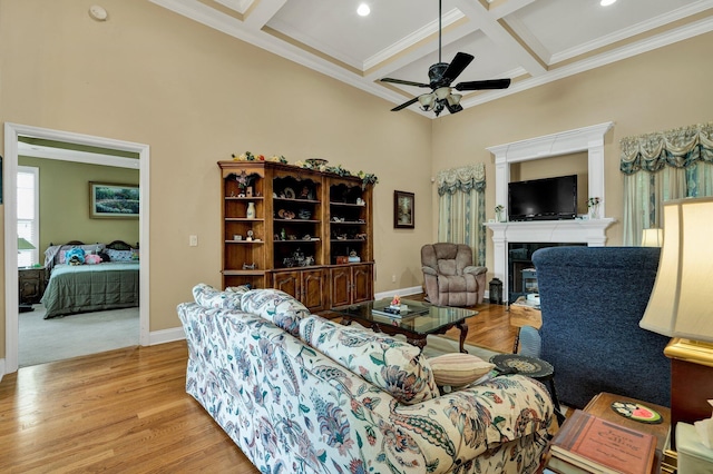 7003 Neville Dr, Ooltewah, TN 37363 - living room featuring coffered ceiling, wood finished floors, ceiling fan, beamed ceiling, and a towering ceiling