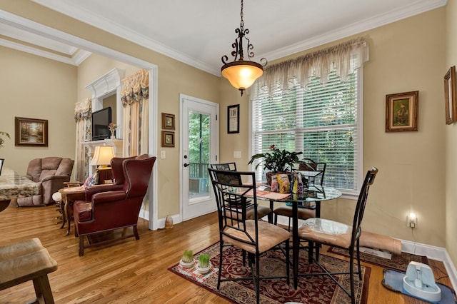7003 Neville Dr, Ooltewah, TN 37363 - dining room featuring wood finished floors and crown molding