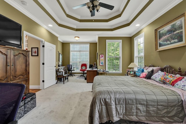 7003 Neville Dr, Ooltewah, TN 37363 - bedroom with ornamental molding, a tray ceiling, light colored carpet, an office area, and ceiling fan