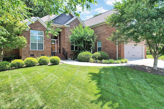 7003 Neville Dr, Ooltewah, TN 37363 - view of front of home with a front lawn, brick siding, and concrete driveway