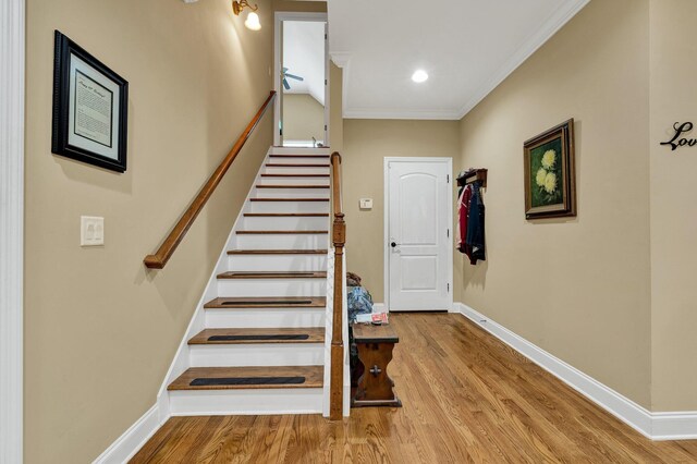 7003 Neville Dr, Ooltewah, TN 37363 - stairway featuring wood finished floors, crown molding, and recessed lighting
