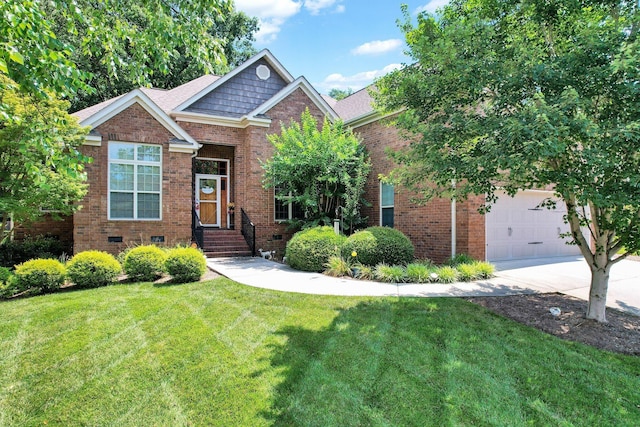 7003 Neville Dr, Ooltewah, TN 37363 - view of front facade with a front yard, brick siding, concrete driveway, and an attached garage