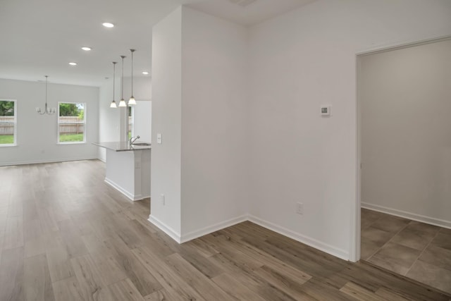 217 Summerlin Dr, Gallatin, TN 37066 - unfurnished room featuring a chandelier, recessed lighting, and wood finished floors