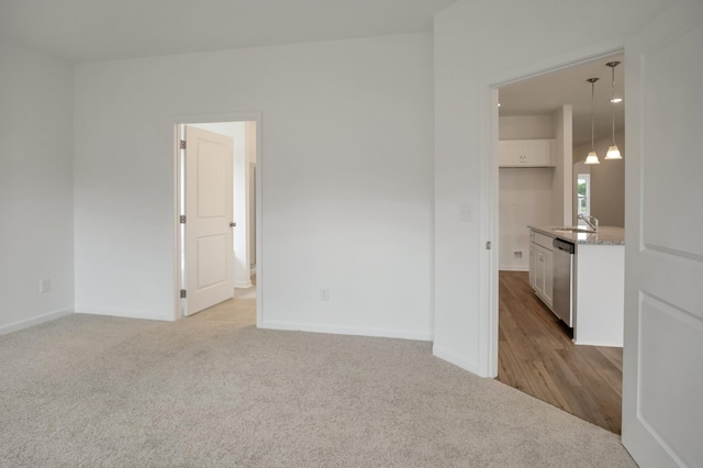 217 Summerlin Dr, Gallatin, TN 37066 - spare room featuring light carpet and baseboards