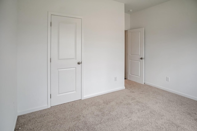 217 Summerlin Dr, Gallatin, TN 37066 - unfurnished bedroom with carpet and baseboards