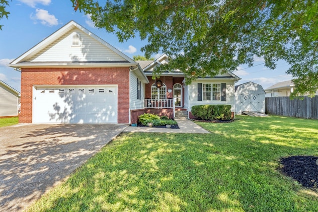 1902 Vicksburg Cir, Columbia, TN 38401 - single story home featuring covered porch, a storage shed, brick siding, driveway, and a garage