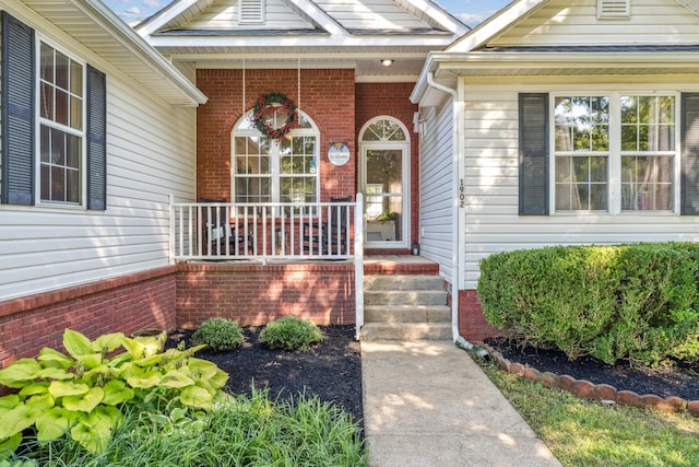 1902 Vicksburg Cir, Columbia, TN 38401 - entrance to property featuring covered porch and brick siding