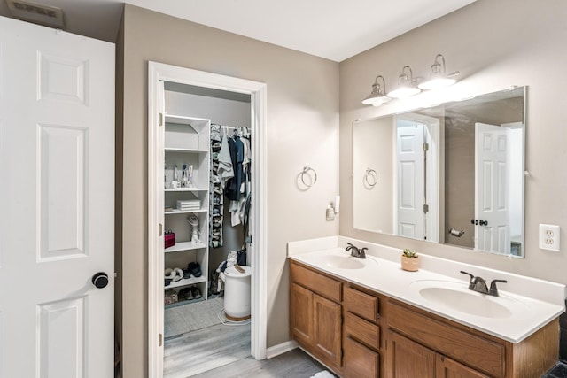 1902 Vicksburg Cir, Columbia, TN 38401 - bathroom with wood finished floors and double vanity
