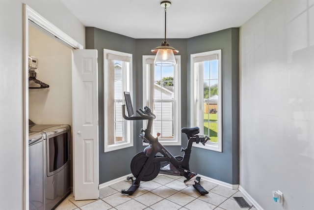 1902 Vicksburg Cir, Columbia, TN 38401 - exercise area featuring washer and dryer and light tile patterned flooring
