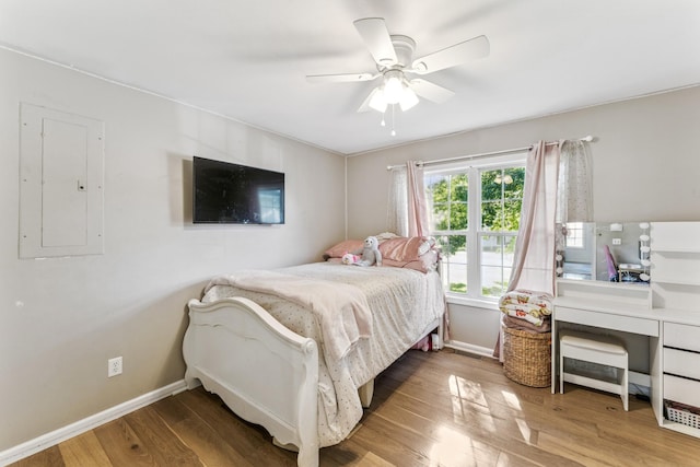1902 Vicksburg Cir, Columbia, TN 38401 - bedroom featuring electric panel, wood finished floors, and a ceiling fan