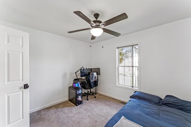 1902 Vicksburg Cir, Columbia, TN 38401 - carpeted bedroom with a desk and a ceiling fan