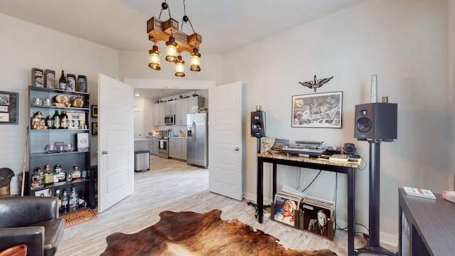308 Whisper Wood Way, Lebanon, TN 37087 - interior space with light wood-style flooring and a chandelier